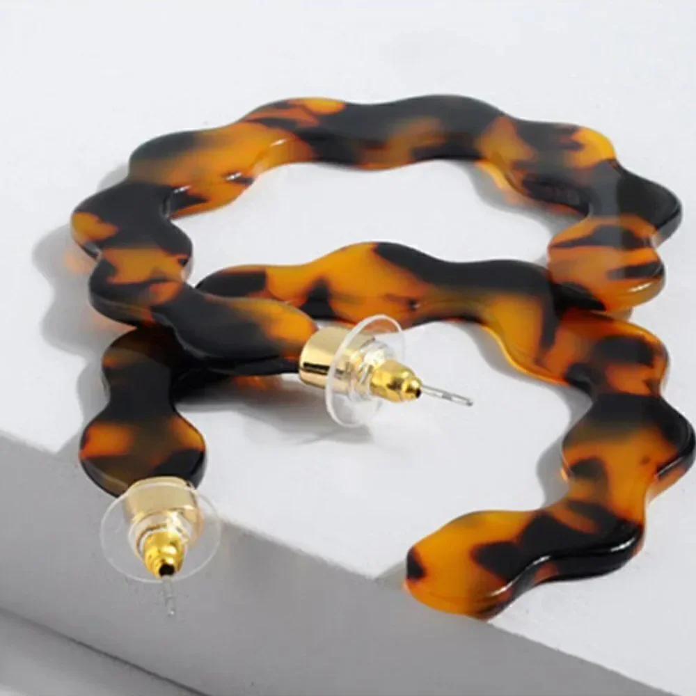 Wavy Resin Hoop Earrings in Dark Brown Tortoiseshell from BaubleBar